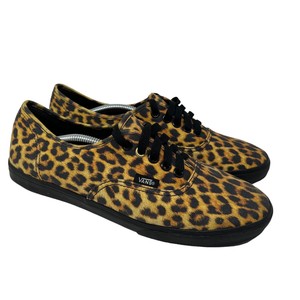 black vans with cheetah fur