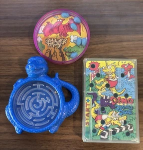 Juguete de comida para niños Wendy's 1992 juegos de dinosaurios carrera de obstáculos portátil - Imagen 1 de 4