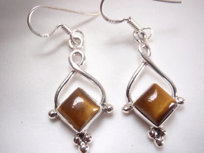 Pendientes de plata de ley 925 ojo de tigre con detalles de puntos de plata obtén par exacto Foto 1 de 2