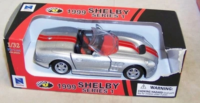 1:32 NEW RAY 1999 SHELBY SERIES 1 ROADSTER SILVER NIB SS-50917 - Image 1 of 4
