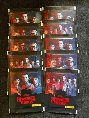 LOT PANINI 10 PACKETS POCHETTES STRANGER THINGS NETFLIX  UNIVERSAL 2022 NEW - Photo 1/2