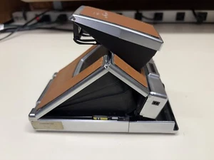 FOTOCAMERA TERRESTRE VINTAGE POLAROID SX-70 ALFA 1 PER RIPARAZIONE RICAMBI CREPA NON FUNZIONANTE - Foto 1 di 11