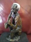 African Sculpture Hand Carved Marble Old Black Man Blowing a Horn Signed Statue
