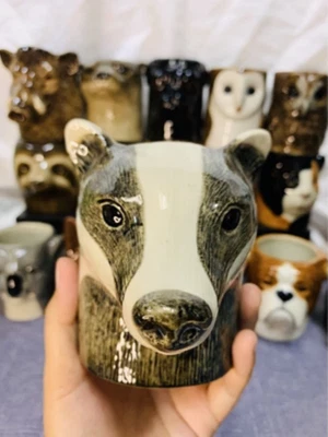 Estatuilla cabeza de tejón florero maceta pluma cerámica planta suculenta flor decoración del hogar Foto 1 de 4