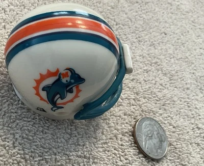 Casco retro Riddell Miami Dolphins Pocket Pro con licencia NFL Foto 1 de 4