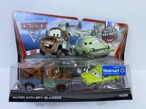 Neu im Karton Disney Pixar Cars 2 Mater mit Spionagebrille & Acer 1:55 Diecast Auto Set  - Bild 1 von 8
