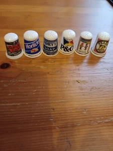 We Have Here 6no Nice Ceramic China Thimbles Of Different Advertising Pictures. - Picture 1 of 7