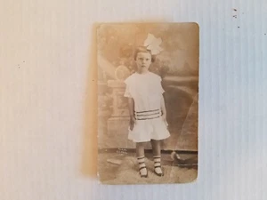 Antique photograph postcard / unused / Young Girl With Bow - Picture 1 of 6