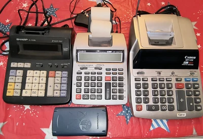4 Calculators Lot (4) Cannon/Casio/Sharp/Texas Instruments (preowned/tested) - Image 1 of 4