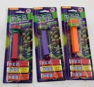 (3) 2014 PEZ Teenage Mutant Ninja Turtles Michelangelo, Raphael, & Donatello - Bild 1 von 2