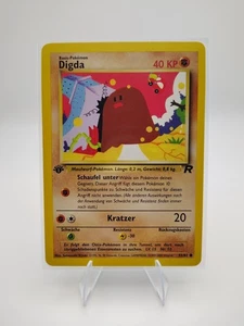 Digda / Diglett 1st Edition German Team Rocket 52/82 Fighting Pokemon LP/NM - Picture 1 of 2