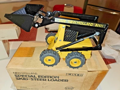 Minicargadora Ertl New Holland Edición Especial 1/16 #320 Die-Cast 1986 Foto 1 de 4