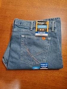 Neu mit Etikett Wrangler FR flammhemmend 20X® 42x34 Vintage Boot Jeans Medium Wash NEU - Bild 1 von 21
