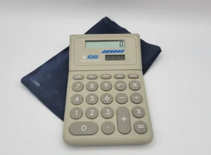 Calculadora de doble potencia de 8 dígitos Atari de colección rara con estuche - Imagen 1 de 10