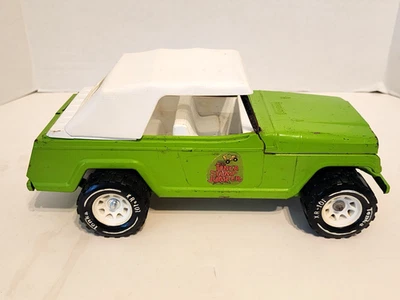 Jeepster de tocón Tonka verde lima vintage de los años 70 con tapa de acero prensado de 13" Foto 1 de 4