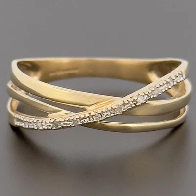 Anillo cruzado de eternidad de diamantes de oro amarillo de 9 quilates talla T 1/2 con sello Foto 1 de 4