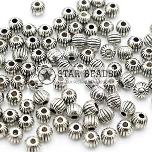 200 X ZINC ALLOY ANTIQUE SILVER PLATED ROUND RIDGED BEADS 4X3MM - Picture 1 of 1