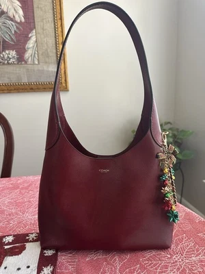 Coach Brooklyn 28 rubí Foto 1 de 4