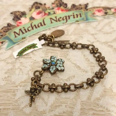 Michal Negrin Chain Bracelet Flower and Angel Charm Blue Crystals Delicate Gift - Image 1 of 4