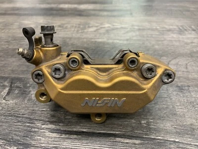 Pinza de freno delantera izquierda Honda 2003 2004 CBR600RR OEM NISIN Foto 1 de 4