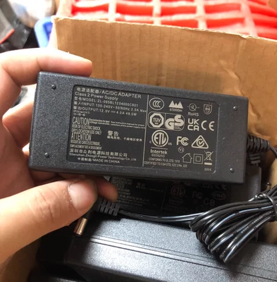ZL-065BL1204000C801 12V 4A 5.5*2.1 Netzteil-Ladegerät - Bild 1 von 2