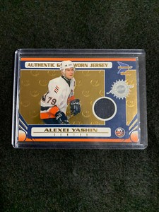2003-04 Pacific Prism Gold Authentic Game Worn Jersey Alexi Yashin 269/1185 #129