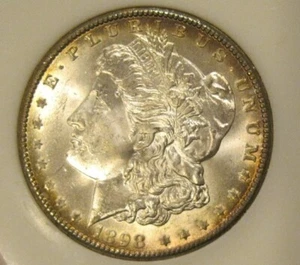 1898 O Morgan Silber Dollar UNC, getönte Rückseite, periphere Ton Vorderseite 4840 - Bild 1 von 2