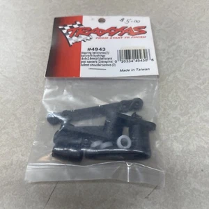 TRAXXAS 4943 Steering Bellcranks (2) Bushings (4) Post Spacers (2) Screws (2) - Picture 1 of 2
