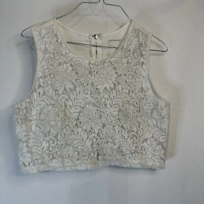 Top corto semi transparente de encaje de ganchillo sin mangas con semillas de mostaza blanco talla grande elegante Foto 1 de 4