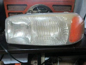 Conjunto de faros GM con soporte de montaje y bombillas #16524543 a controlador IZQUIERDO - Imagen 1 de 2
