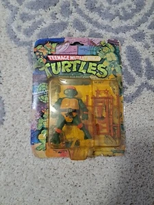 Figura de acción Playmates Toys Teenage Mutant Ninja Turtles Michaelangelo 1988 - Imagen 1 de 11