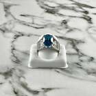 18 K White Gold Oval Blue Zirconia and Diamond Ring