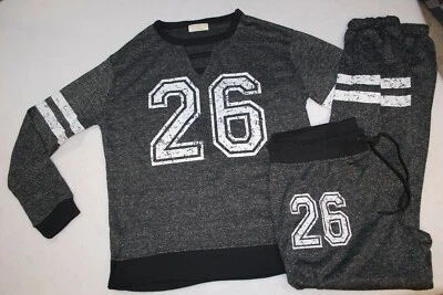 Conjunto de atletismo para mujer CAMISA L/S tejida negra blanca jaspeada L 12-14 Foto 1 de 3