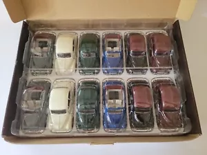 Vintage Saico Morris Minor 1000 1/26 scale trade box 12 mint models pull back - Picture 1 of 12