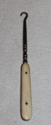 Gancho botón zapato o guante vintage 6 1/4" con mango de hueso 2 pasadores Foto 1 de 4