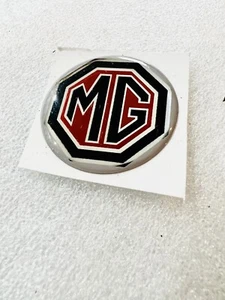 Mg   self adhesive 27 mm quality resin badge - Picture 1 of 1