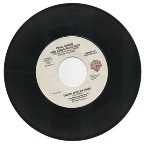 PAUL SIMON & LINDA RONSTADT  45 RPM Promo Record   "UNDER AFRICAN SKIES"   MINT! - Foto 1 di 2