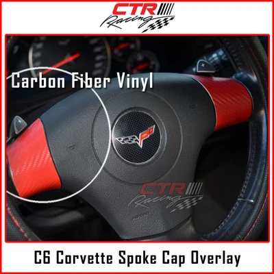 Наклейка на крышку со спицами рулевого колеса C6 Corvette красное углеродное волокно 05-13  - Изображение 1 из 3