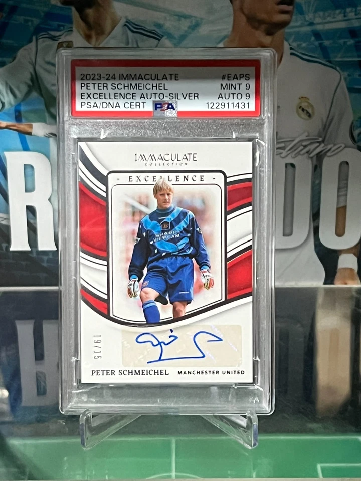 2023-24 Panini Colección Inmaculada Excelencia Peter Schmeichel Automático/15 PSA 9 Foto 1 de 4