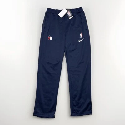 Pantalones de calentamiento emitidos por el equipo de la NBA Nike Philadelphia 76ers DN7077-419 para hombre L-TALL Foto 1 de 4