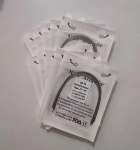 10 paquetes de cables dentales activados térmicamente Niti Arch ortodoncia rectangular naturaleza - Imagen 1 de 11