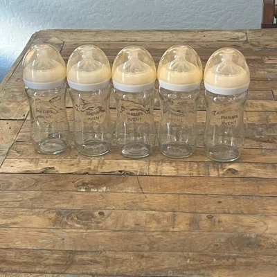Juego de 5 biberones de vidrio con cubiertas Philips Avent de 8 oz nivel 4 y 5 Foto 1 de 4