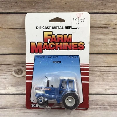 Retired Ertl Die Cast Metal Farm Implement Ford 1/64 Toy TW-35 Tractor With Cab - Image 1 of 3