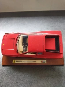 Modelauto Ferrari auf Holz - Bild 1 von 1