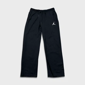 Pantalones deportivos Nike para hombre grandes negros Jumpman atléticos cómodos gimnasio jogger - Imagen 1 de 9