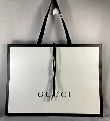 "Bolsa de regalo de compras GUCCI 19 X 14 X 3"" blanca con logotipo negro" Foto 1 de 2
