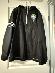 Seattle Sounders schwarze wetterfeste Kapuzenjacke für Herren 1/4 Reißverschlusstasche vorne Lg - Bild 1 von 9