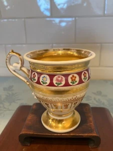 An tique cup on gold pedestal - Picture 1 of 6