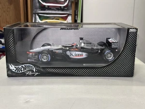 1:18 Hot Wheels F1 race car #6 KIMI RAIKKONEN McLaren Mercedes MP4/17D 2002 - Picture 1 of 6