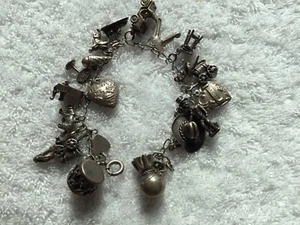 PULSERA VINTAGE CON DIJE DE LEY CARGADA MÓVIL—¡DULCE! - Imagen 1 de 24